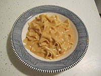 noodles and paprikash sauce